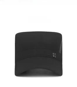 Front view of a black flat top military cap with a metal logo plate on high-quality fabric