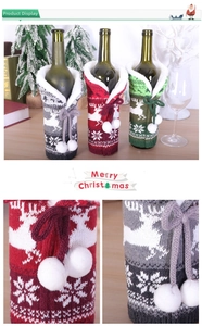 Detailed knit wine bottle covers featuring reindeer motifs and faux fur trim