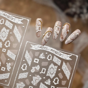 Elegant 5D white lace relief nail stickers with retro frames and 3D floral textures