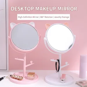Pink and white cat-ear makeup mirrors with 360-degree rotation and jewelry storage stand