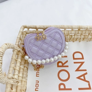 Quilted heart-shaped mini handbag for girls featuring a pearl handle and gold chain strap