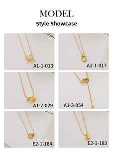 Showcase of six minimalist titanium steel gold necklaces with various luxury pendants