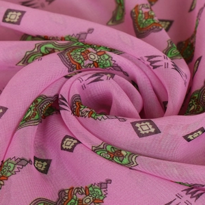 Close-up of semi-transparent pink chiffon fabric with bohemian geometric pattern detail