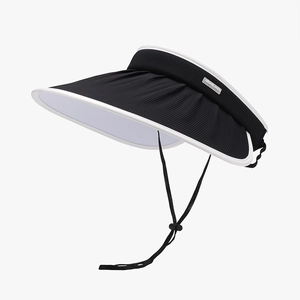 Foldable women's wide brim UV sun hat in black with white trim and adjustable chin strap