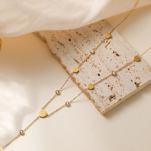 Elegant 18K gold plated stainless steel necklace with heart charms and zircon stones