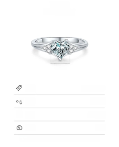 Macro detail of S925 sterling silver ring showing 6x6mm heart-cut cubic zirconia and hallmark