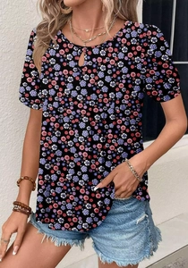 Close-up of floral print top with hollow-out neckline detail and casual short sleeves