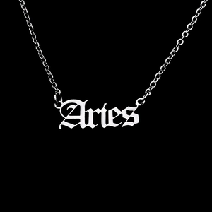 Gothic Aries zodiac pendant detail on a polished stainless steel curb chain necklace