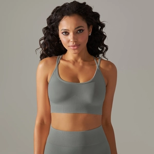 Close-up of seamless knitted gray sports bra with wide ribbed support band