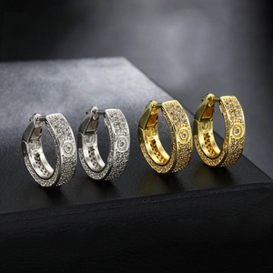 Hip hop iced out hoop earrings in gold and silver with pave zircon and screw pattern
