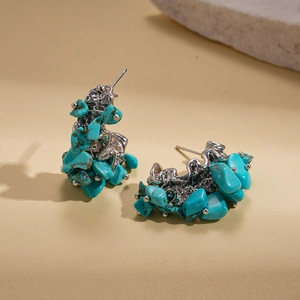 Vintage silver C-shaped earrings with inlaid irregular turquoise stones and wrinkled texture