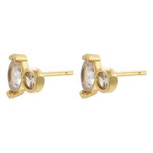 Macro detail of gold marquise cut cubic zirconia stud earrings with a luxury finish