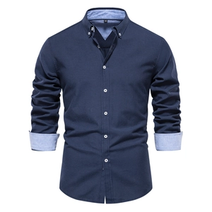 Slim fit navy long sleeve shirt for men with light blue collar and cuff accents