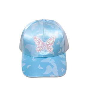 Detail of light blue satin baseball cap with sequined pink butterfly and printed patterns