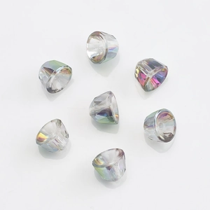 Macro detail of 8mm rainbow AB crystal bell beads with faceted cut and center hole