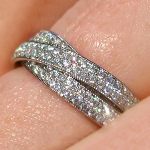 Elegant multi-layer pavé set crown ring with silver finish and sparkling zircons
