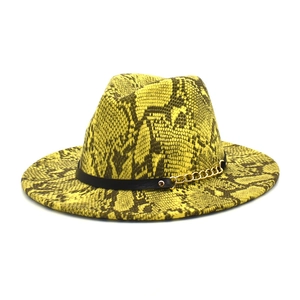 Yellow snakeskin print fedora hat with wide brim, black band and gold chain decoration