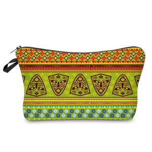 Toiletry bag featuring African masks and geometric patterns with a black zipper closure