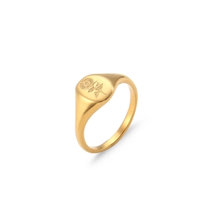 Detalle de anillo de sello vintage chapado en oro con grabado de girasol pulido