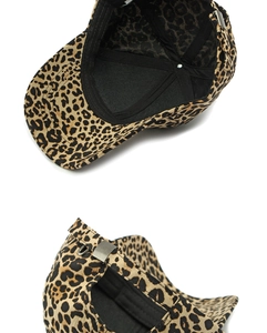 Detail view of leopard print baseball cap with metal buckle and inner sweatband