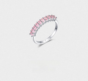 Detailed close-up of S925 silver ring featuring eleven oval pink cubic zirconia stones