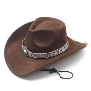 Detail of dark brown wool felt cowboy hat featuring ethnic band and turquoise buckle