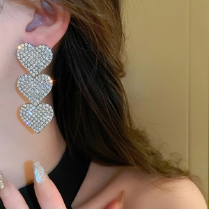 Elegant silver triple heart tassel drop earrings with sparkling rhinestones for women