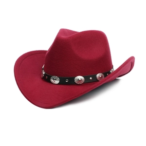 Detail of wine red wool cowboy hat featuring silver sunflower rivets on black leather band