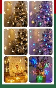 Detail of warm white and colorful LED string lights in star, ball and butterfly shapes