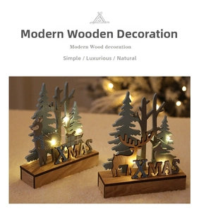 Close-up of wooden XMAS reindeer figurines with warm LED lighting and laser-cut pine trees