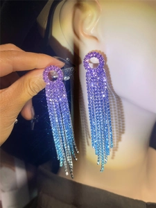 Detailed view of long tassel rhinestone earrings with blue-purple gradient finish
