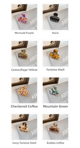 Selection of small acetate hair claws in various patterns like marble and tortoiseshell