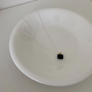Minimalist 925 sterling silver necklace with a black rectangular zircon padlock pendant