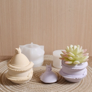 Macro detail of dragon egg silicone mold and finished embossed textured storage jars
