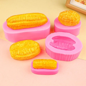 Stampo in silicone rosa per bastoncini di pasta e dolci tondi con campioni di cibo realistici