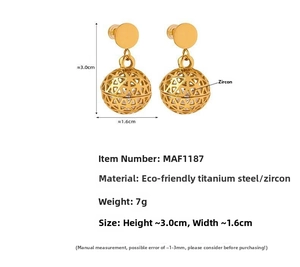 Macro detail of gold-plated titanium steel hollow earrings with zircon stone inlay
