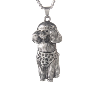 Vintage silver poodle pendant necklace featuring polka dot detail on a stainless chain