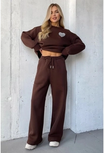 Detail of dark brown knitted lounge set with heart print sweatshirt and drawstring pants
