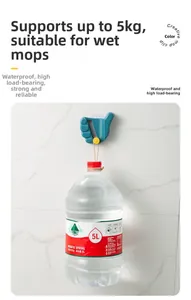 Wall-mounted mop holder showing 5kg heavy-duty load capacity on marble tile wall