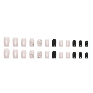 Faux ongles carrés courts noir et blanc avec strass aurora et finition brillante chic