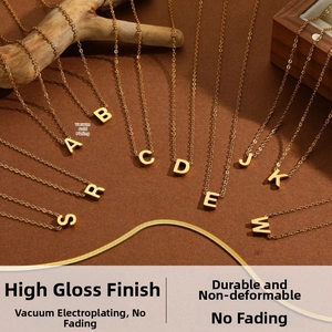 Detail of vacuum gold-plated initial necklaces with high hardness and non-fading finish