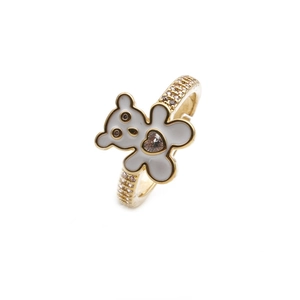 Detail of gold-plated bear ring with white heart enamel and sparkling zircon band