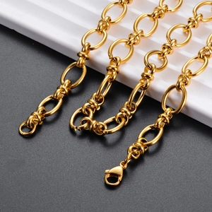 Macro shot of gold stainless steel oval link chain with lobster clasp for jewelry making