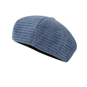 Classic blue woven newsboy hat with white grid pattern for a vintage academy look