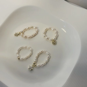 Baroque freshwater pearl beaded rings set with bear, star, and heart charms for women