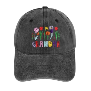 Detail of Grandma embroidery and colorful floral patterns on washed charcoal grey baseball cap