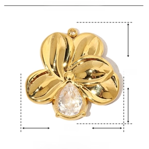 Detailed view of 22mm gold flower pendant with teardrop zircon and stainless steel