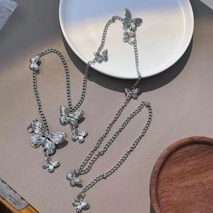 Vintage Y2K silver butterfly waist chain belt with multiple 3D pendants for women