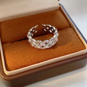 Exquisite 18k gold plated hollow flower open ring with zircons on velvet box