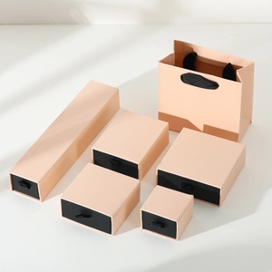 Light pink jewelry gift box set with drawer boxes and matching shopping bags